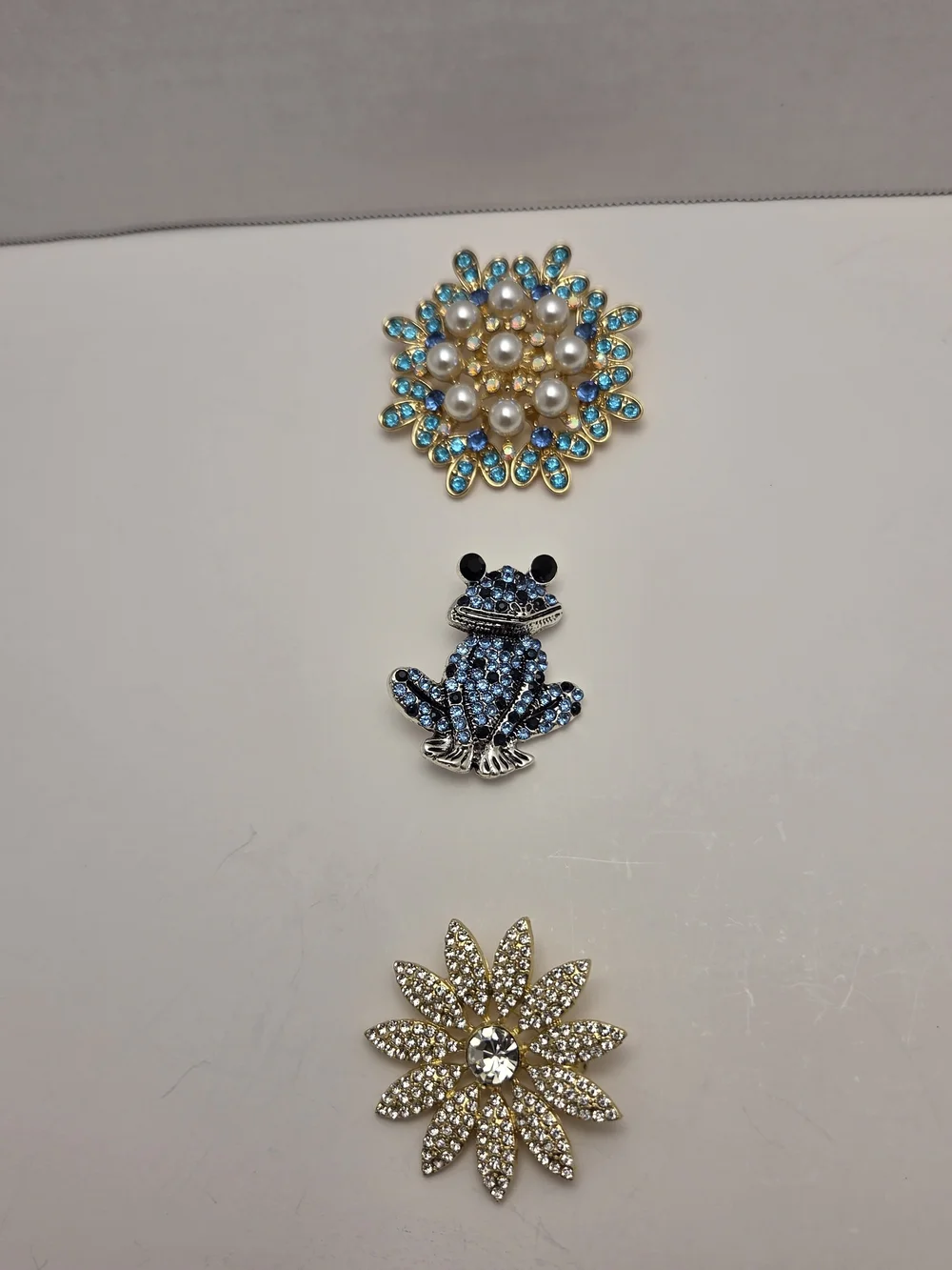 Gold Tone Floral Brooch with Blue Crystals and Pearls